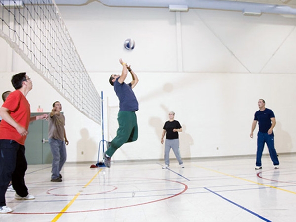 Group of people playing volleyball