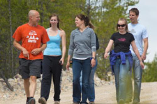 An image of a group of students walking down a road